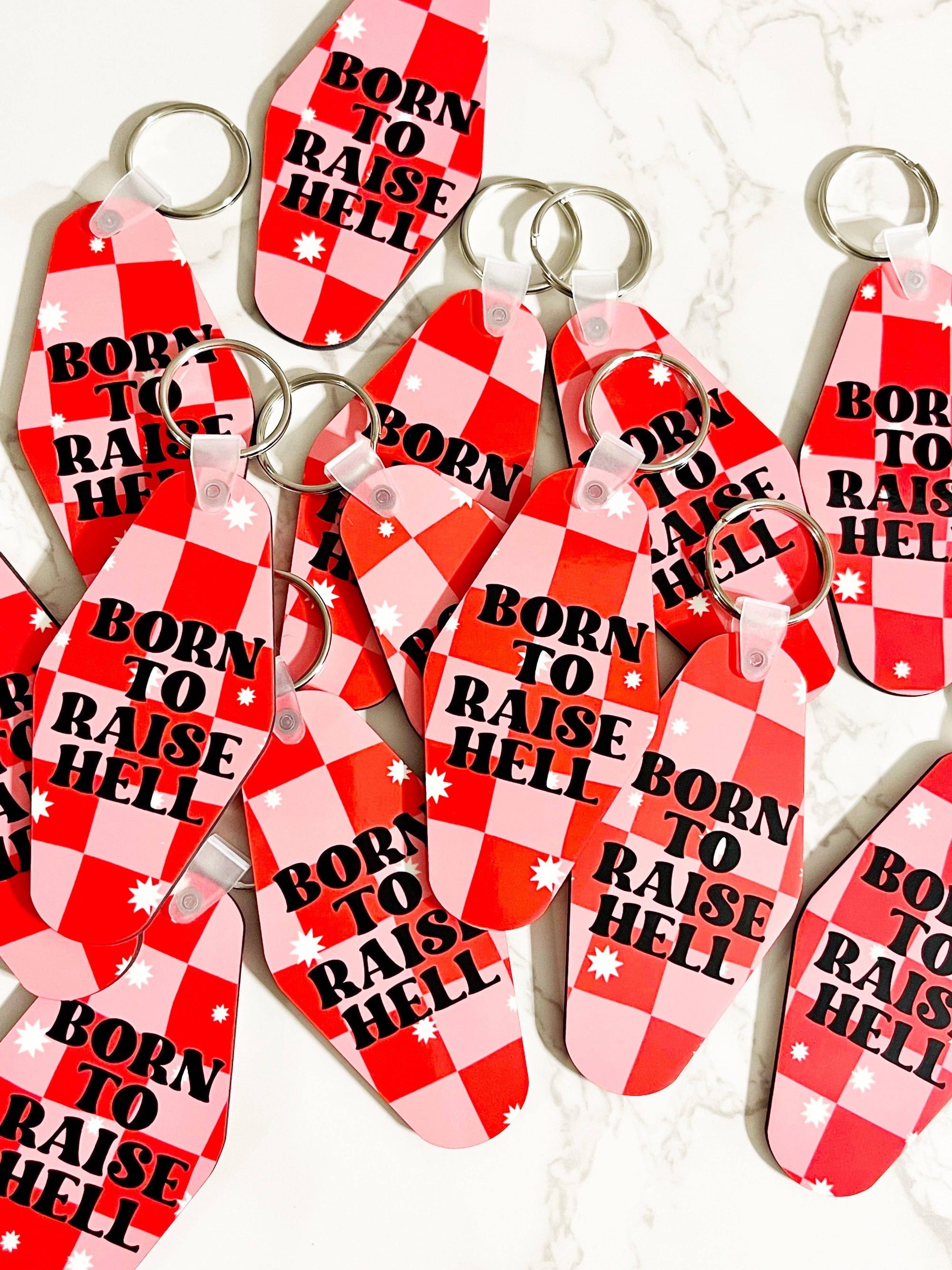 Sonny Rising - Motel Style Keychain, Born To Raise Hell Design